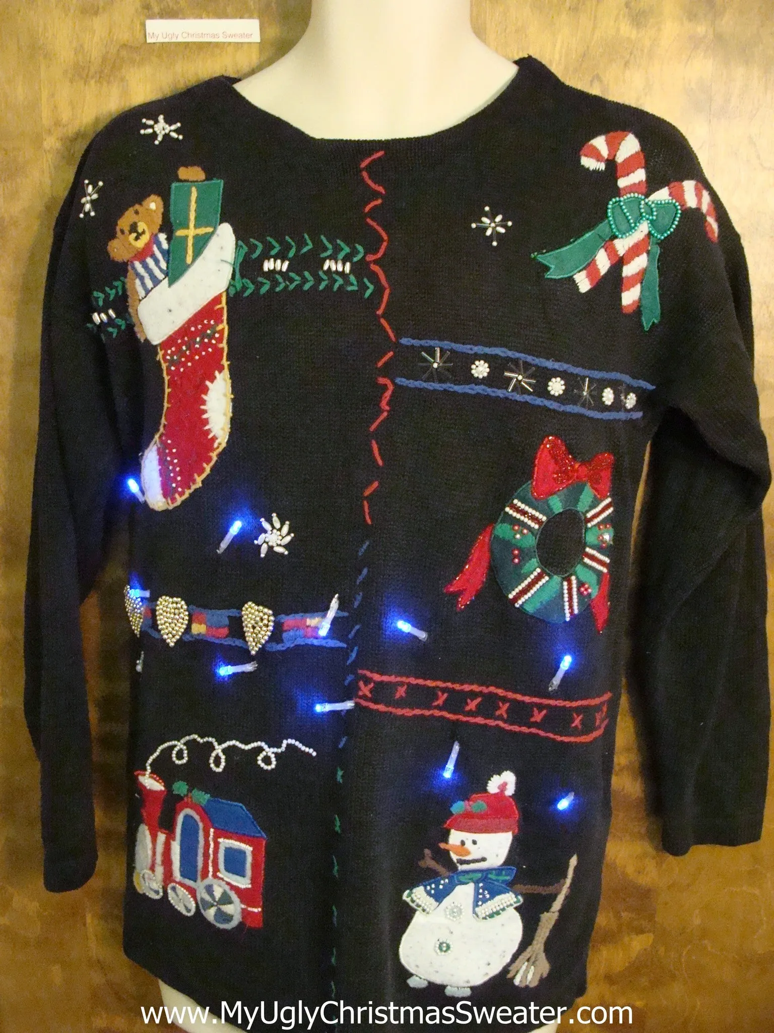 Cute Christmas Sweater with Lights with Candycanes and Stocking