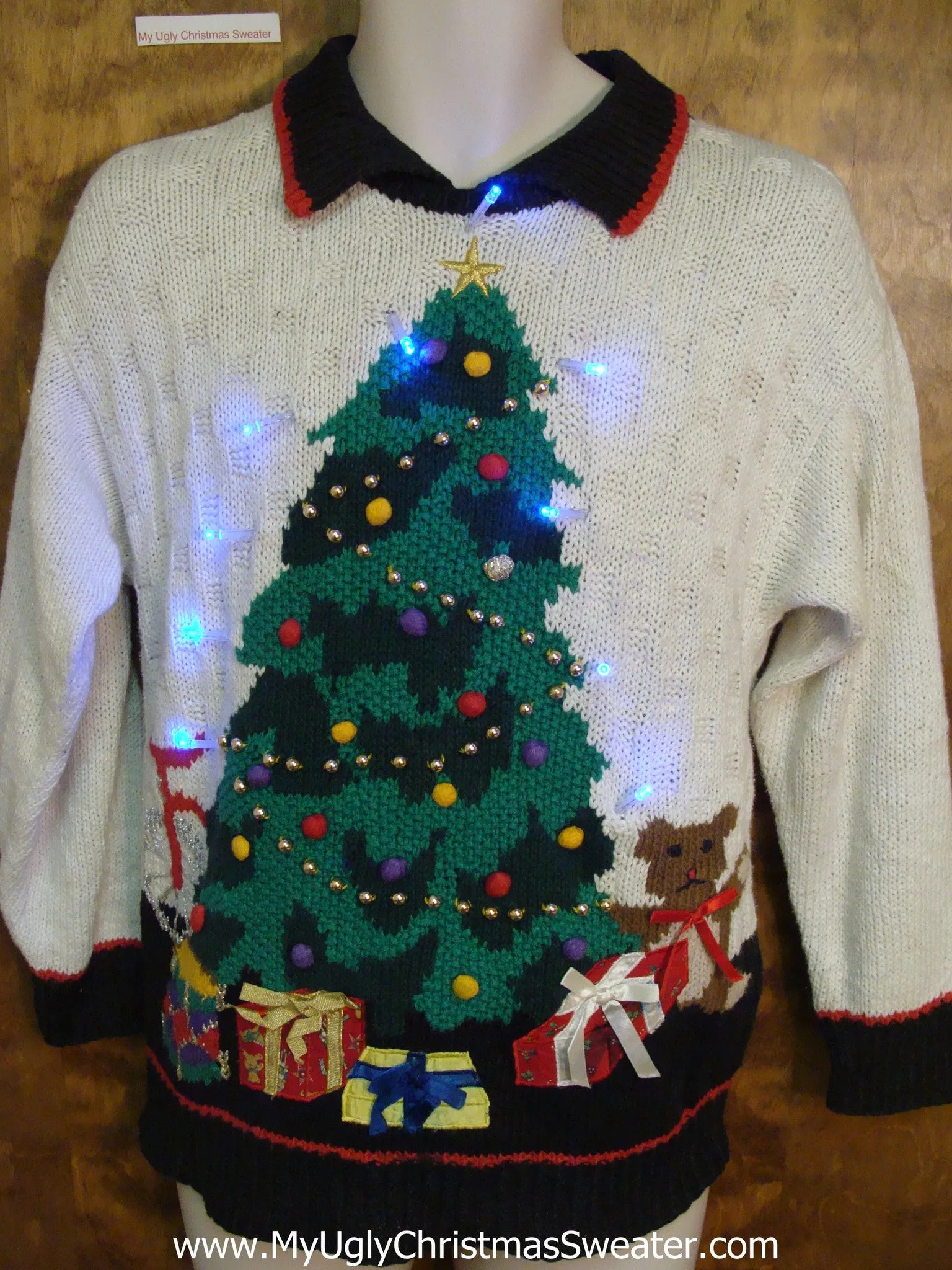 The Leaning Tree with Toys Light Up Ugly Christmas Jumper